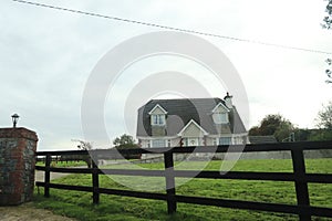 Exploring Ireland Countryside - greenary, blue sky, small houses - Irish countryside tours photo