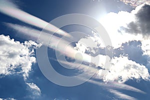 iridescent clouds in the blue sky