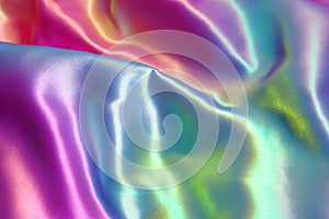 Iridescent fabric background. Shiny mother of pearl fabric, bright multi-colored fabric