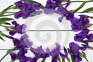 Iris flowers bouquet on white wooden table