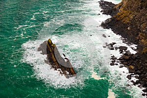 Irish coast. Breaking wave in the sea, Ireland Europe