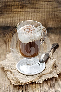 Irish coffee on wooden table