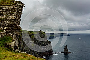 Irish countryside view on the Cliffs of Moher and the Branaunmore sea stack