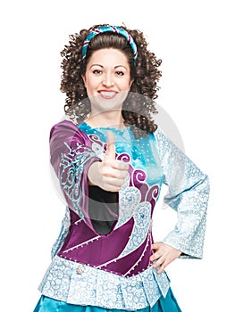 Irish dancer showing thumbs up sign