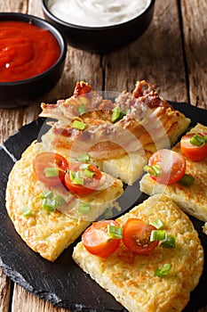 Irish food: potato pancakes Boxty with bacon, tomato and sauce c