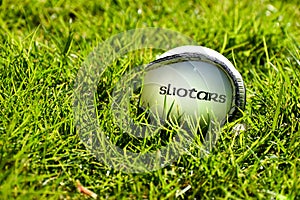 Irish Hurling or Camogie sliotar ball on a grass playing field