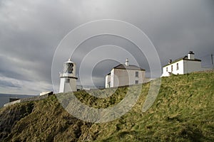 Irish lighthouse and houses