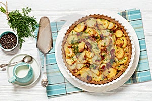 Irish potato pie with bacon in baking dish