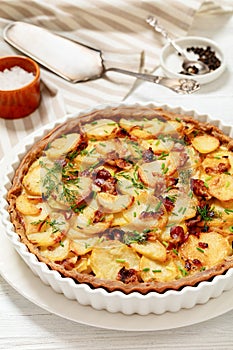 Irish potato pie with bacon in baking dish