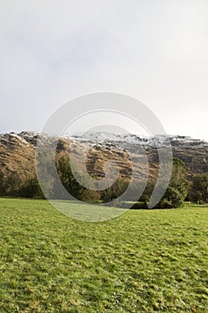 Irish rocky mountain and fields snow scene