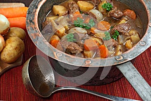 Irish stew in old copper pot