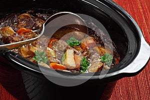 Irish stew in a slow cooker pot photo