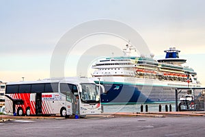 Irizar i6 near the cruise ship