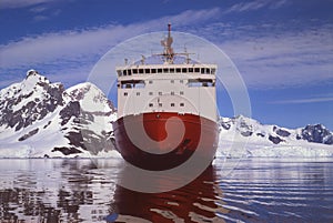 Irizar icebreaker saling across the antarctica, View of the bow of the ship and sea and ice to the horizon. Global warming is photo