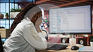 Irked software developer frustrated while coding, struggling to do optimizations