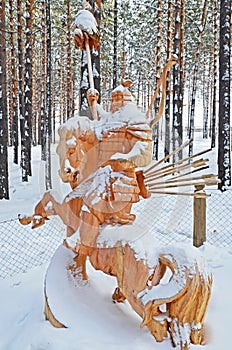 Irkutsk Region,Russia-Jan, 03 2015: Hercules on horseback. Park of wooden sculptures in Savvateevka Village