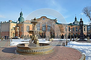 Irkutsk, Russia, March, 03, 2017. Fountain `Swan song` and `big Ben` in the Park of the 350 anniversary of Irkutsk in the early sp