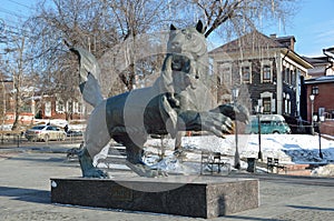 Irkutsk, Russia, March, 03, 2017. People walking near Babr - the symbol of the city of Irkutsk