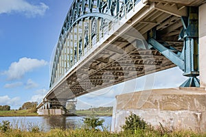 Iron Arch bridge over river IJssel near Dutch city Zwolle