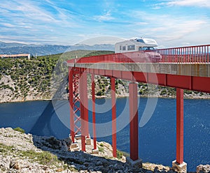 Iron arch bridge with a road.