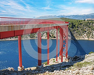 Iron arch bridge with a road.