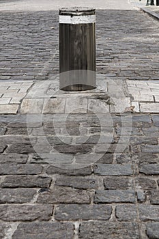 Iron bollard, as barrier in Dutch street, Maastricht. The Netherlands