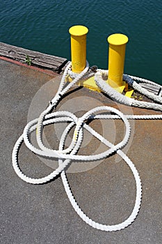 Iron bollard and rope