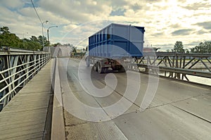 The iron bridge across the river.