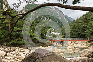 Iron bridge over mountain river