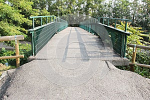 Iron bridge and road asphalt photo