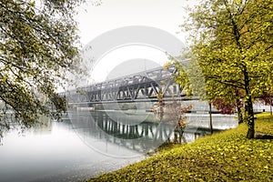 Iron bridge on Ticino river in flood