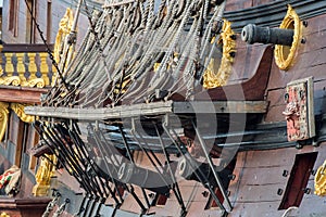 Iron cannon on sail ship