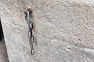 iron chain on ancient church wall
