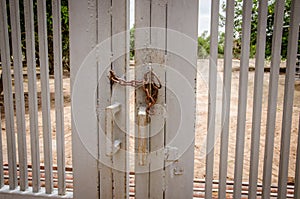 Iron Chain on a barred Double Gate