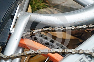 The iron chain of a bicycle