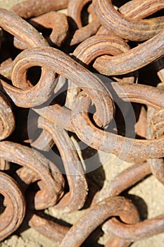Iron Chain. Iron Chains in a pile on the ground with rust and dirt