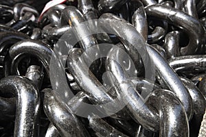 Iron chains close-up. They are unused and have a gray metallic color. He was taken in the store.