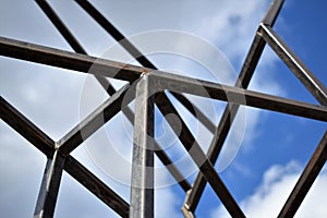 Iron construction with sky background