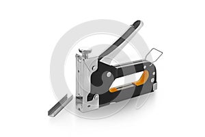Iron construction stapler and staples isolated on a white background