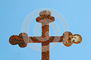 Iron cross in front of the parish church of St Jerome in Lun, island of Pag, Croatia