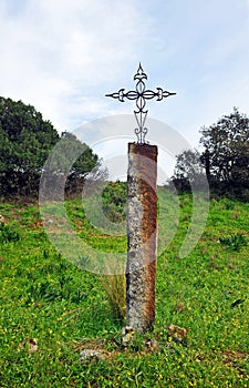 Iron Cross in the Mozarabic Camino de Santiago, Cerro Muriano, Mountains of Cordoba, Spain photo