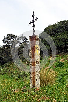 Iron Cross in the Mozarabic Camino de Santiago, Cerro Muriano, Mountains of Cordoba, Spain photo