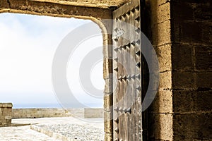Iron doors inside of the Alcazaba of AlmerÃ Â­a, in Andalusia, southern Spain photo