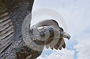 Iron eagle with sky background