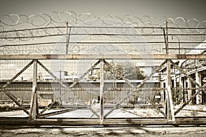 Iron fence & barbed wire