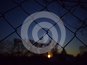 iron fence sunset