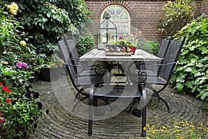 Iron forged table and chairs photo