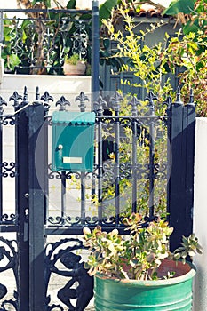 Iron gate with mailbox