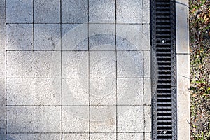 Iron grate of drainage system for storm water drainage from pedestrian footpath in public park