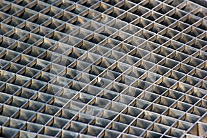 Iron gutter grates and metal vent grids as background photo